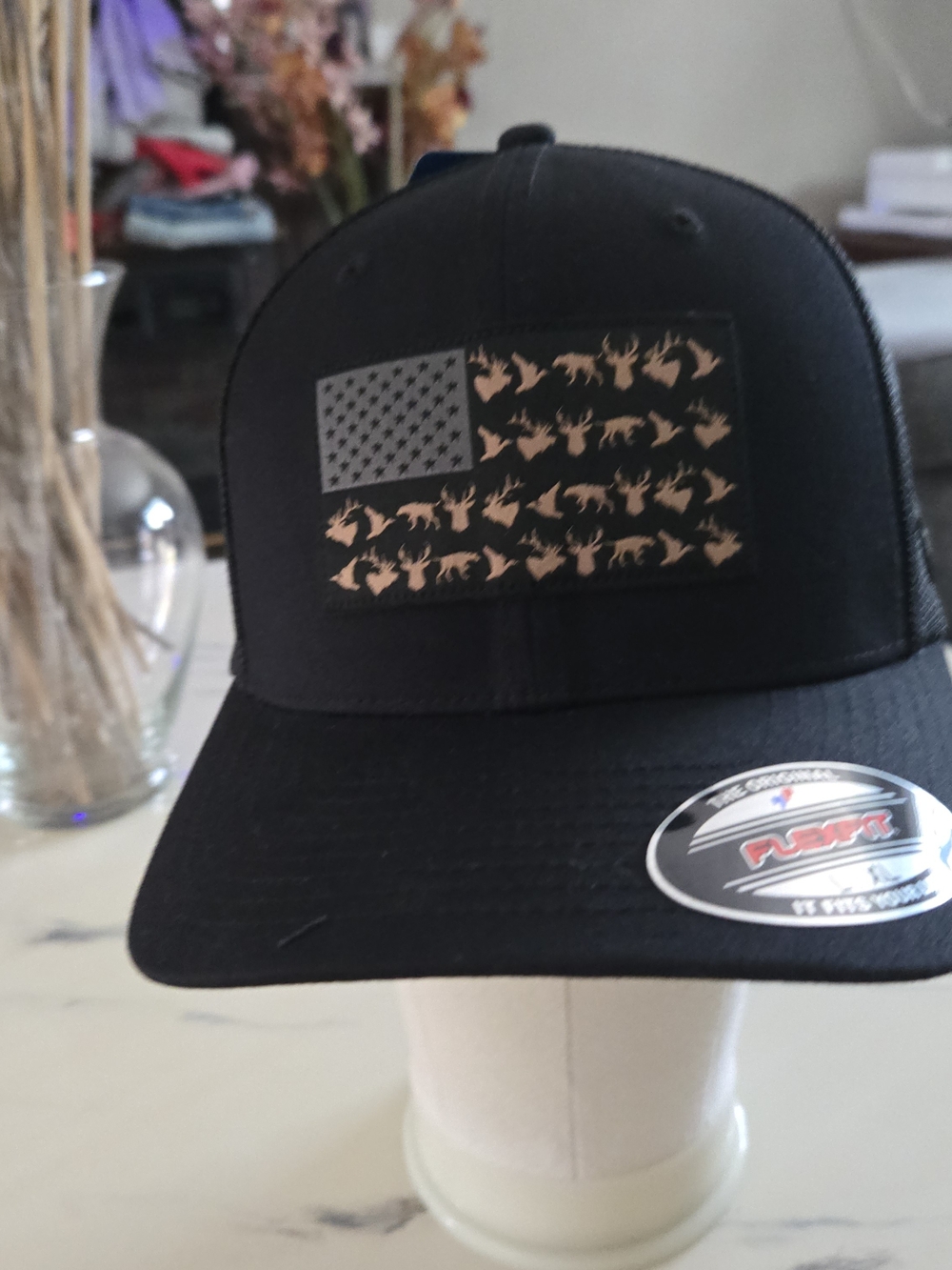 Columbia Black Trucker Hat with Copper Flag Patch